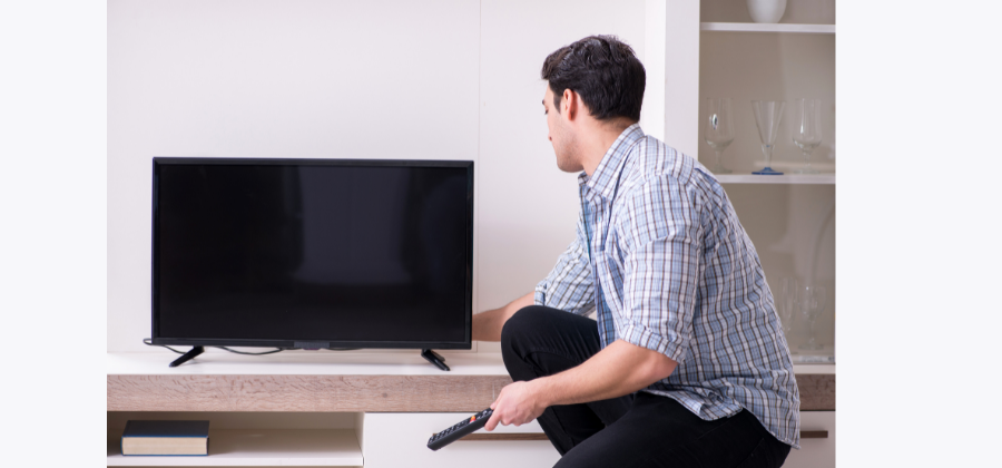 TV Has No Sound But Not Muted - man Troubleshooting tv 